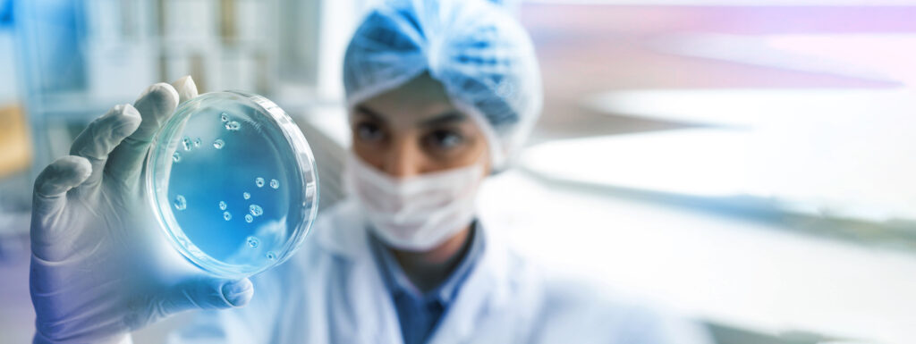 front view doctor holding petri dish